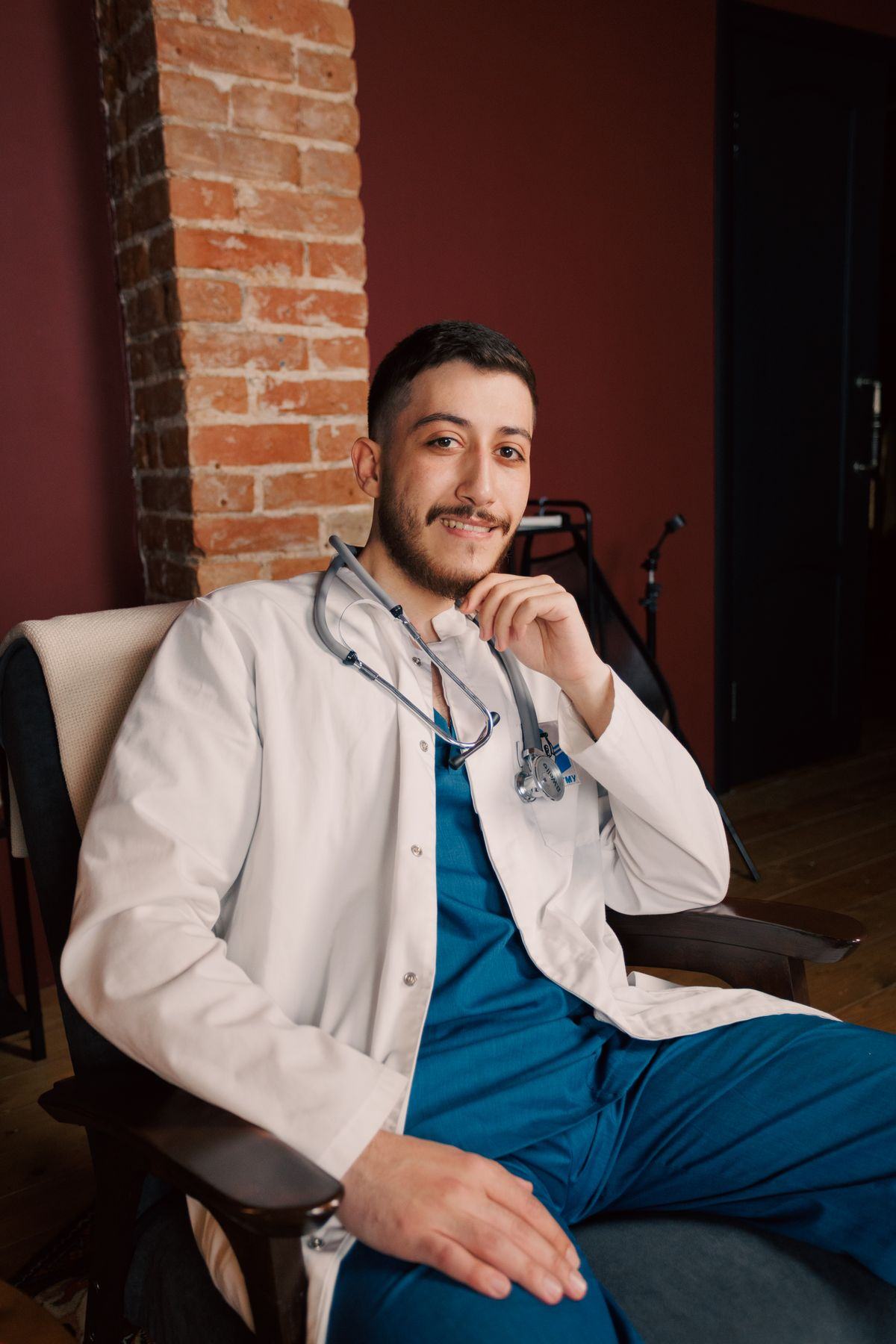 A dentist smiling in the practice